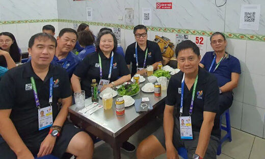 Mother of star swimmer Schooling impressed by Hanoi street food