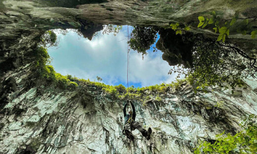 Alluring sinkhole in middle of Dong Van rock plateau