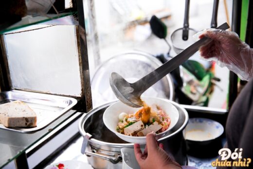 Filled with delicious food at the dining alley 284 Le Van Sy, where the famous honey tofu truck was once