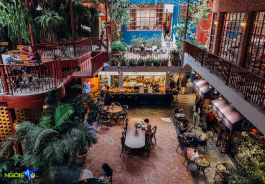 A sprawling green coffee shop in Hanoi