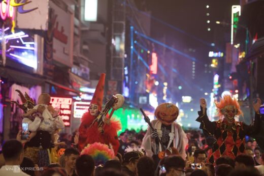 Ho Chi Minh City’s walking street is crowded with people dressed up for Halloween night